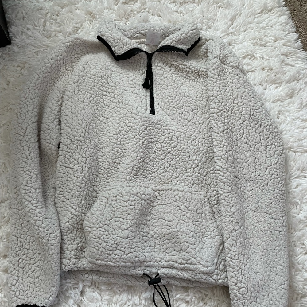 white fluffy jacket